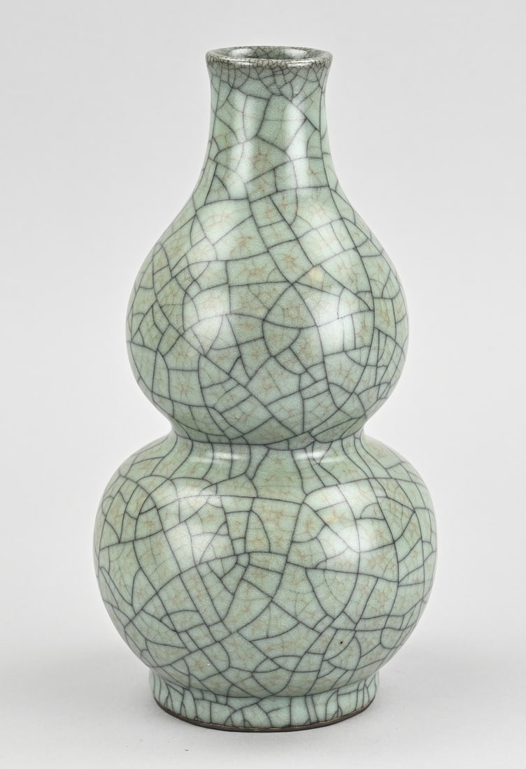 Celadon bulbous vase, H 23 cm.: Old Chinese porcelain celadon bulbous vase with crackle glaze. Dimensions: H 23 cm. In good condition.