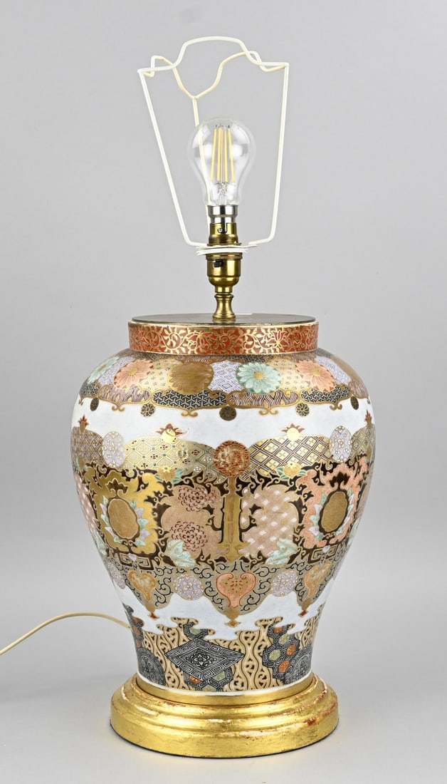 Satsuma lamp, H 60 cm.: Beautiful antique Japanese porcelain Satsuma lamp base with floral/geometric decoration. Detailed. With a gilded wooden base. Dimensions: H 60 cm. In good condition.