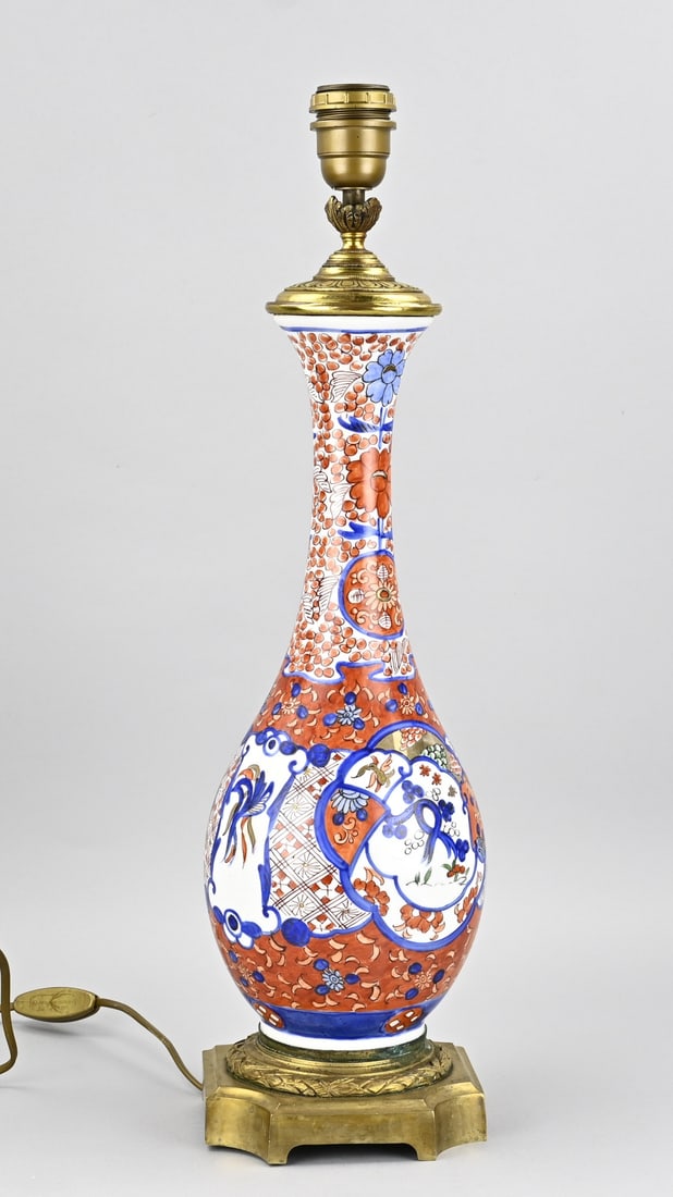 Imari lamp base, H 57 cm.: Antique Japanese porcelain Imari lamp base with floral/gold decoration + bronze fittings. Dimensions: H 57 cm. In good condition.