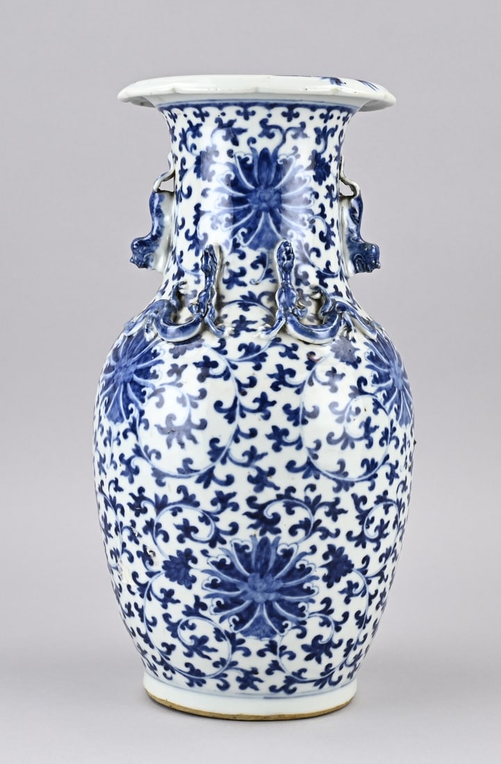 Chinese vase, H 35.3 cm.: 18th - 19th Century Chinese porcelain vase with peony/dragon decoration in relief. Dimensions: H 35.3 cm. In good condition.