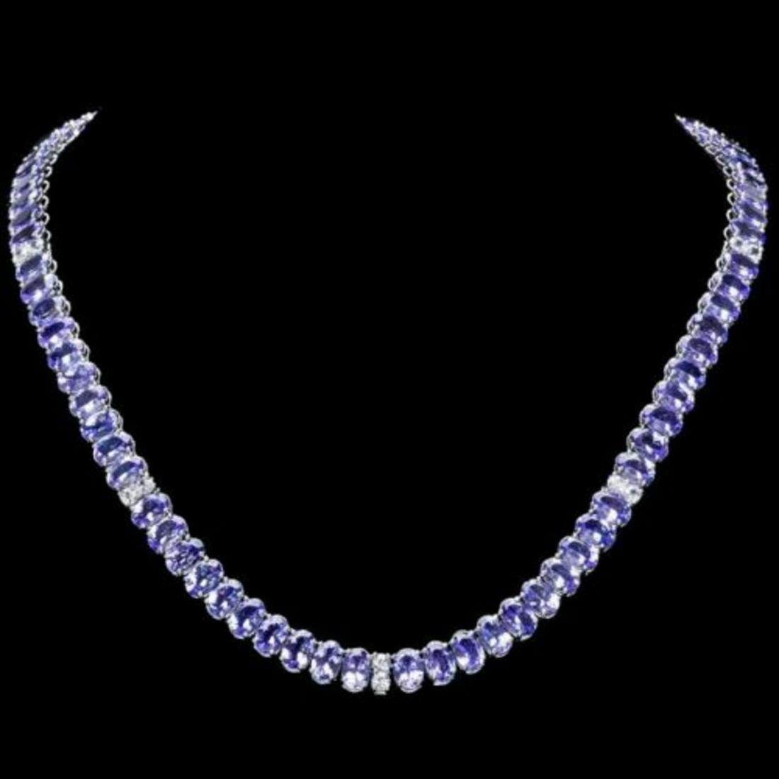 14K White Gold 52.80ct Tanzanite and 1.75ct Diamond Necklace: Retail: $39,872.00 ****** 14K White Gold 52.80ct Tanzanite and 1.75ct Diamond Necklace ****** Metal: 14K White Gold / Total Item Weight: 35.5 Grams / Country Made: United States / / Main Stone: Tanzan