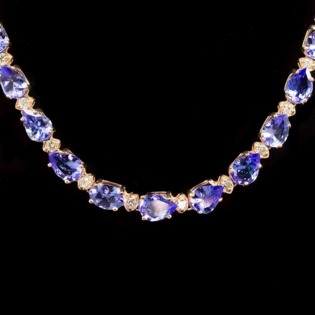 14k Gold 26.60ct Tanzanite 1.77ct Diamond Necklace: Retail: $25,830.00 ****** 14k Gold 26.60ct Tanzanite 1.77ct Diamond Necklace ****** Metal: 14K Solid Gold / Total Item Weight: 22.7 grams / Country Made: United States / / Main Stone: Tanzanite / Colo