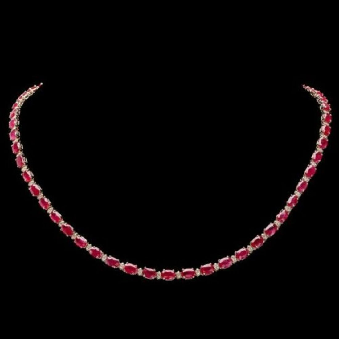 14K Yellow Gold 22.85ct Ruby and 1.05ct Diamond Necklace: Retail: $15,760.00 ****** 14K Yellow Gold 22.85ct Ruby and 1.05ct Diamond Necklace ****** Metal: 14K Yellow Gold / Total Item Weight: 20.0 Grams / Country Made: United States / / Main Stone: Ruby / Co