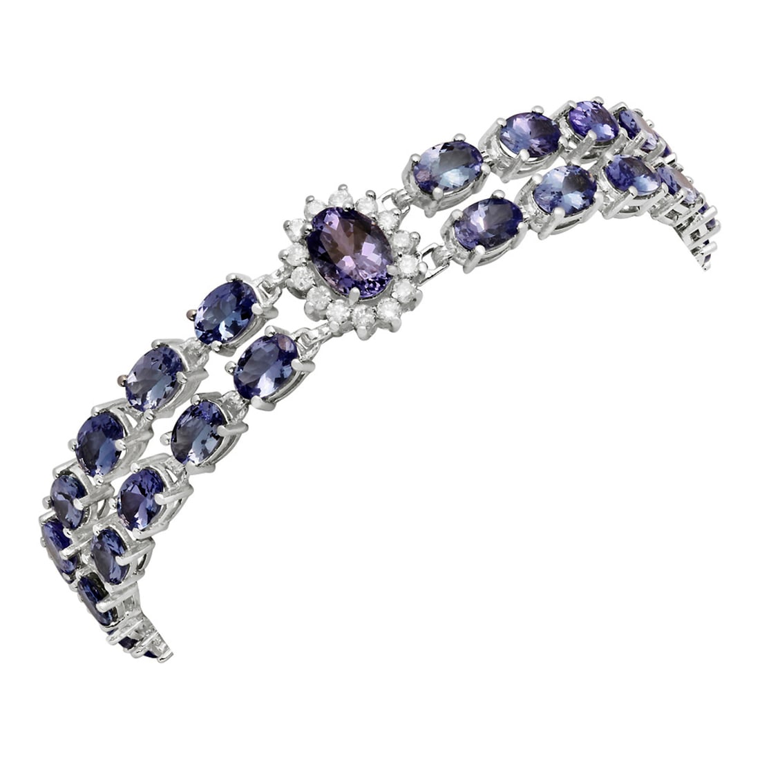 14k White Gold 17.96ct Tanzanite 1.31ct Diamond Bracelet: Retail: $14,450.00 ****** 14k White Gold 17.96ct Tanzanite 1.31ct Diamond Bracelet ****** Metal: 14K White Gold / Total Item Weight: 23.60 grams / Country Made: United States / / Main Stone: Tanzanite