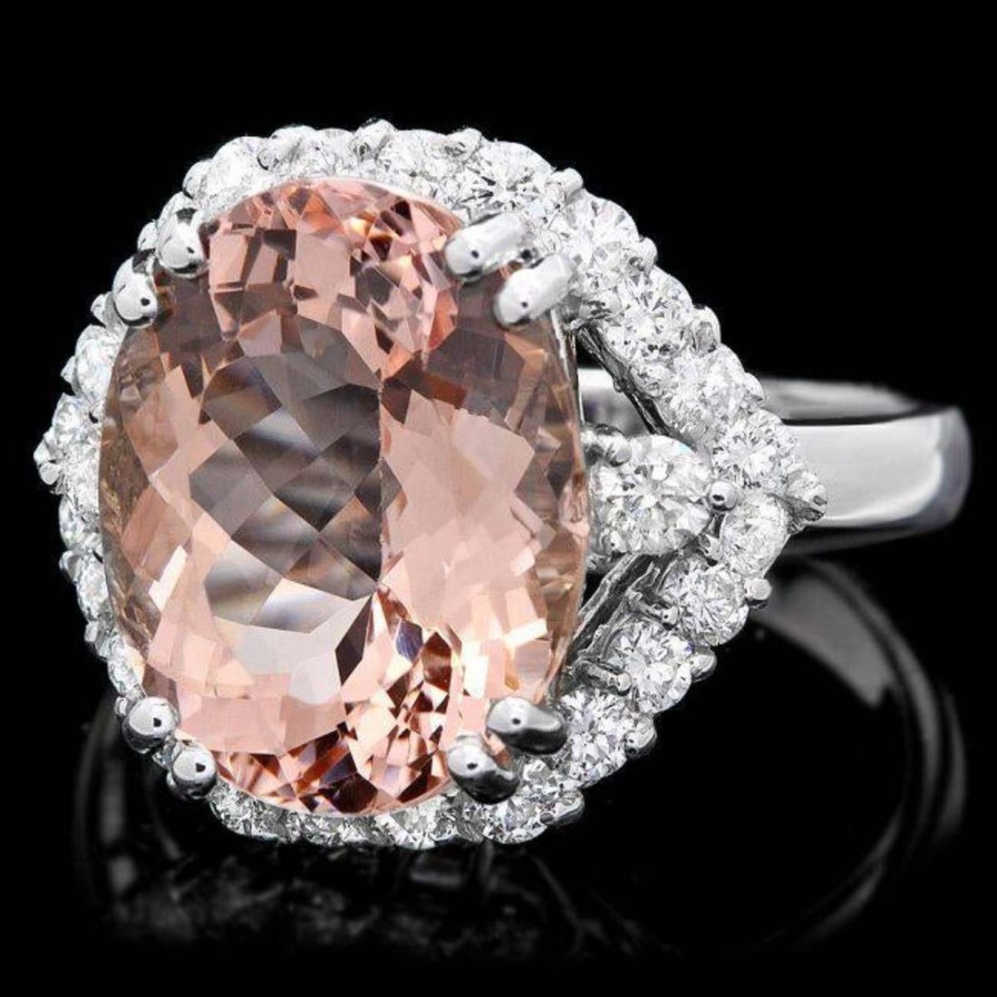 14K White Gold 6.08ct Morganite and 1.04ct Diamond Ring: Retail: $10,326.00 ****** 14K White Gold 6.08ct Morganite and 1.04ct Diamond Ring ****** Metal: 14K White Gold / Total Item Weight: 6.5 Grams / Country Made: United States / / Main Stone: Morganite /