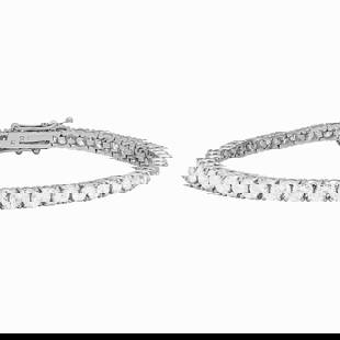 18k White Gold 9.02ct Diamond Tennis Bracelet: Retail: $41,650.00 ****** 18k White Gold 9.02ct Diamond Tennis Bracelet ****** Metal: 18K White Gold / Total Item Weight: 13.60 grams / Country Made: United States / / Main Stone: Diamond / Color: Non