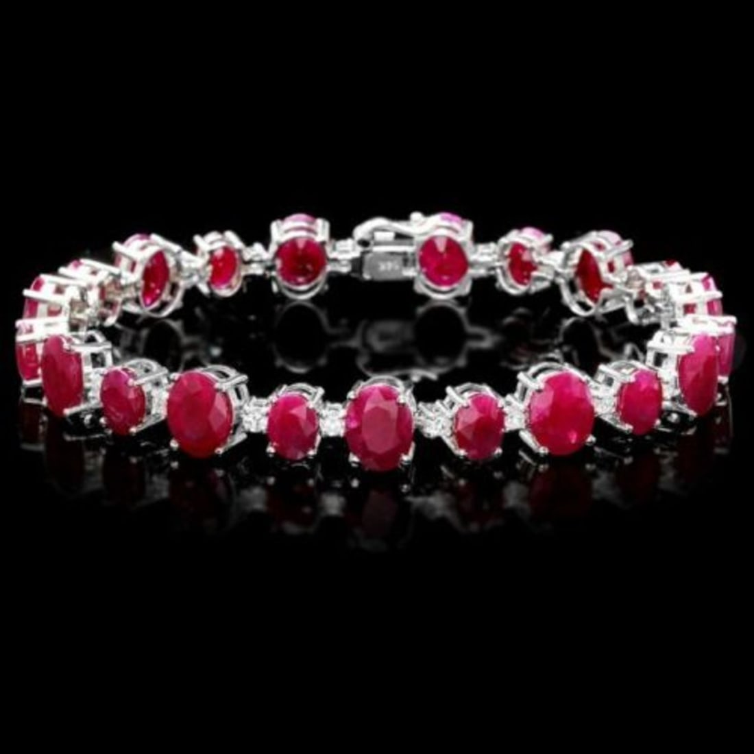 14K Gold 40.13ct Ruby 1.49ct Diamond Bracelet: Retail: $22,025.00 ****** 14K Gold 40.13ct Ruby 1.49ct Diamond Bracelet ****** Metal: 14K White Gold / Total Item Weight: 23.5 Grams / Country Made: United States / / Main Stone: Ruby / Color: Red / C