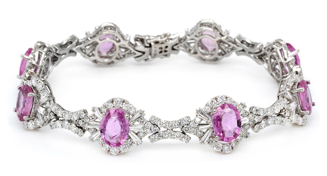 18K White Gold Ladies Bracelet with 9.41ct Pink Sapphires and 6.47ct tw Adjacent Diamonds: Retail: $24,500.00 ****** 18K White Gold Ladies Bracelet with 9.41ct Pink Sapphires and 6.47ct tw Adjacent Diamonds ****** Size: 7 / Metal: 18K White Gold / Total Item Weight: 18.1 Grams / Country Mad