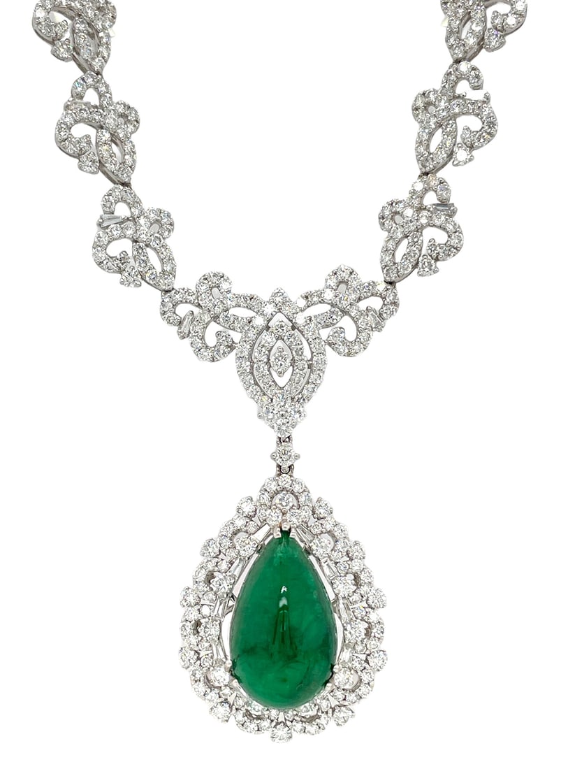 18K White Gold Ladies Necklace with 12.65ct GIA Certified Emerald and 15.65ct tw Adjacent Diamonds: Retail: $75,000.00 ****** 18K White Gold Ladies Necklace with 12.65ct GIA Certified Emerald and 15.65ct tw Adjacent Diamonds ****** Size: 17.5 / Metal: 18K White Gold / Total Item Weight: 41.1 Grams /