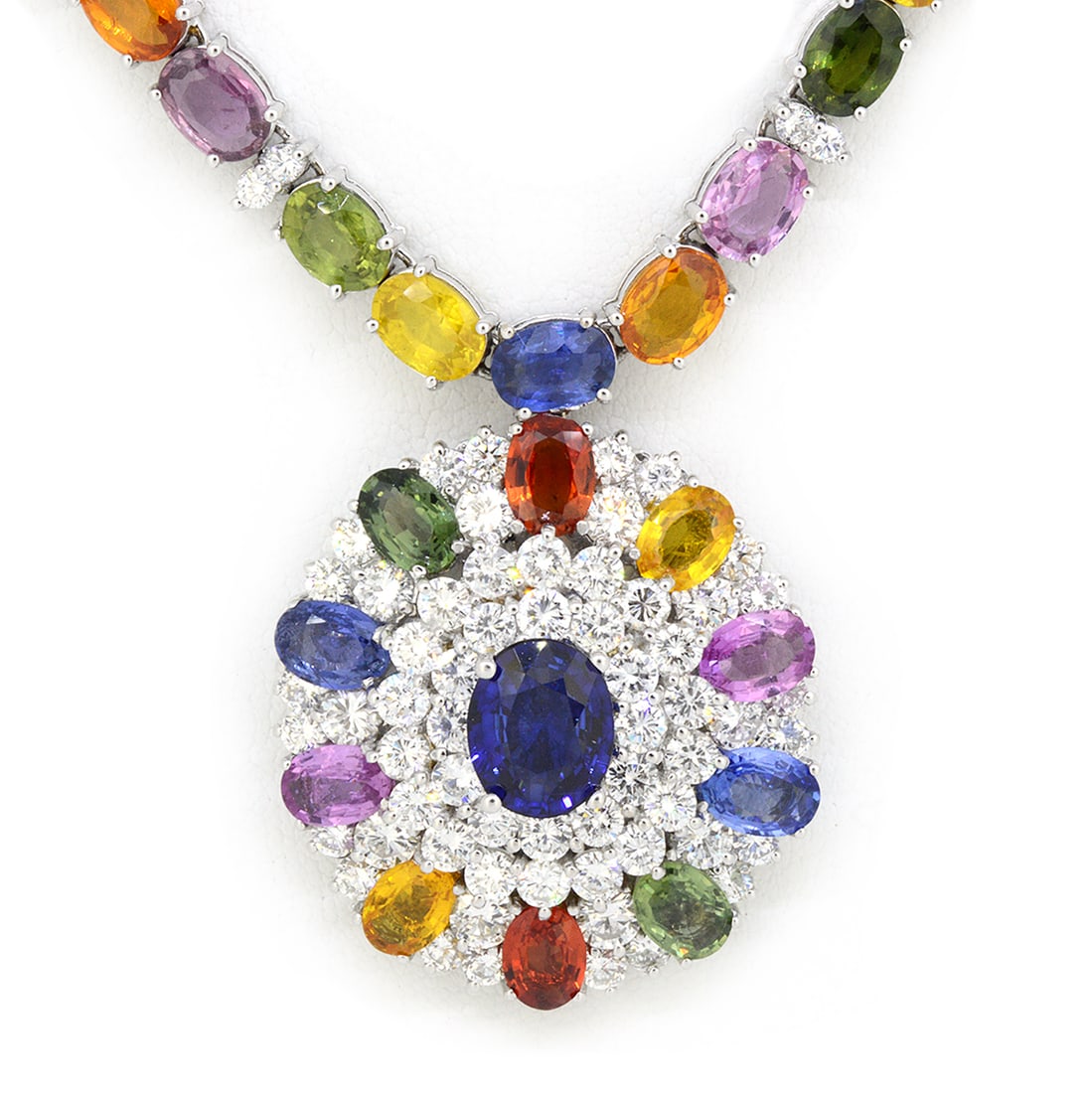 18K White Gold Ladies Necklace with 65.37ct tw Sapphire and 1.72ct tw Diamonds: Retail: $52,500.00 ****** 18K White Gold Ladies Necklace with 65.37ct tw Sapphire and 1.72ct tw Diamonds ****** Size: 17 / Metal: 18K White Gold / Total Item Weight: 57.3 Grams / Country Made: United