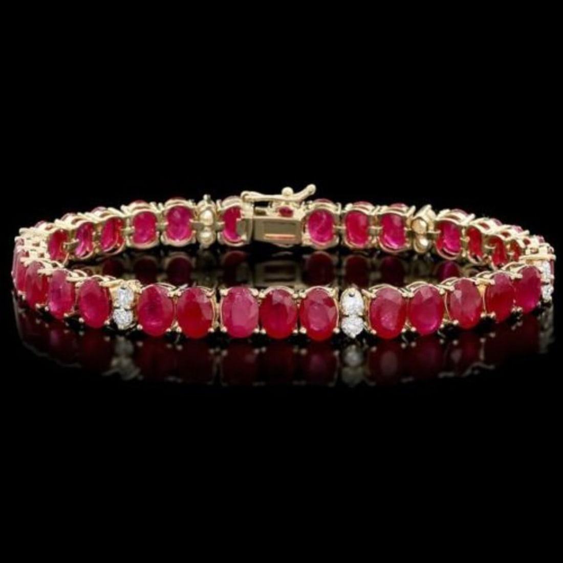 14K Gold 29.69ct Ruby 1.21ct Diamond Bracelet: Retail: $16,260.00 ****** 14K Gold 29.69ct Ruby 1.21ct Diamond Bracelet ****** Metal: 14K Yellow Gold / Total Item Weight: 22.0 Grams / Country Made: United States / / Main Stone: Ruby / Color: Red /