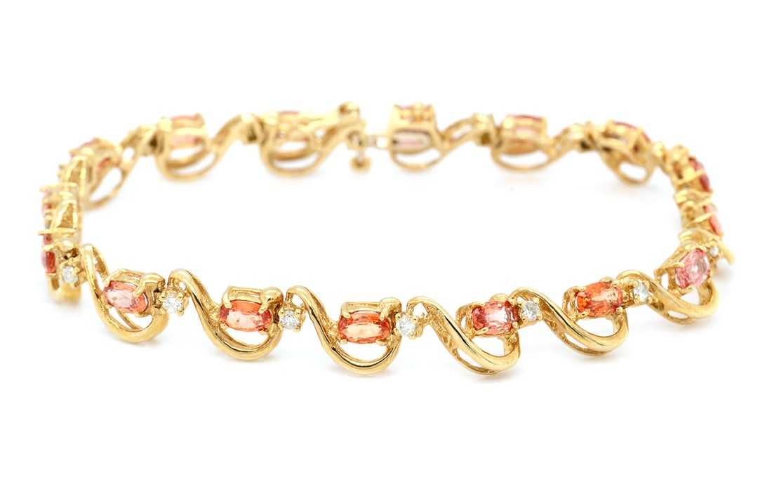 14K Yellow Gold Ladies Bracelet with 5.03tcw Sapphires and 0.45tcw Diamonds: Retail: $7,500.00 ****** 14K Yellow Gold Ladies Bracelet with 5.03tcw Sapphires and 0.45tcw Diamonds ****** Size: 7 / Metal: 14K Yellow Gold / Total Item Weight: 12.8 Grams / Country Made: United