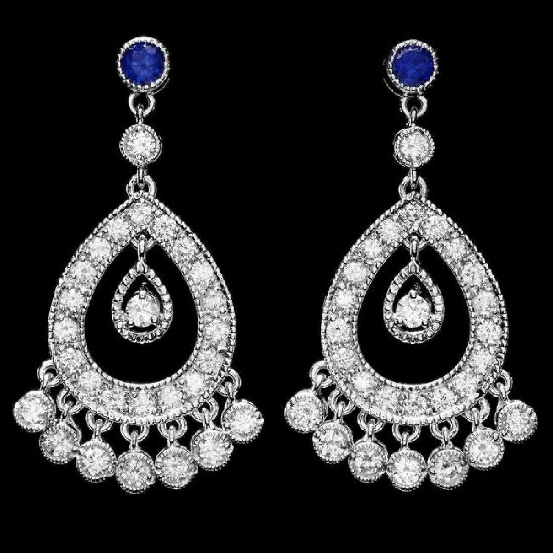 14K White Gold 0.66ct Sapphire and 2.88ct Diamond Earrings: Retail: $9,850.00 ****** 14K White Gold 0.66ct Sapphire and 2.88ct Diamond Earrings ****** Metal: 14K White Gold / Total Item Weight: 11.0 Grams / Country Made: United States / / Main Stone: Sapphire