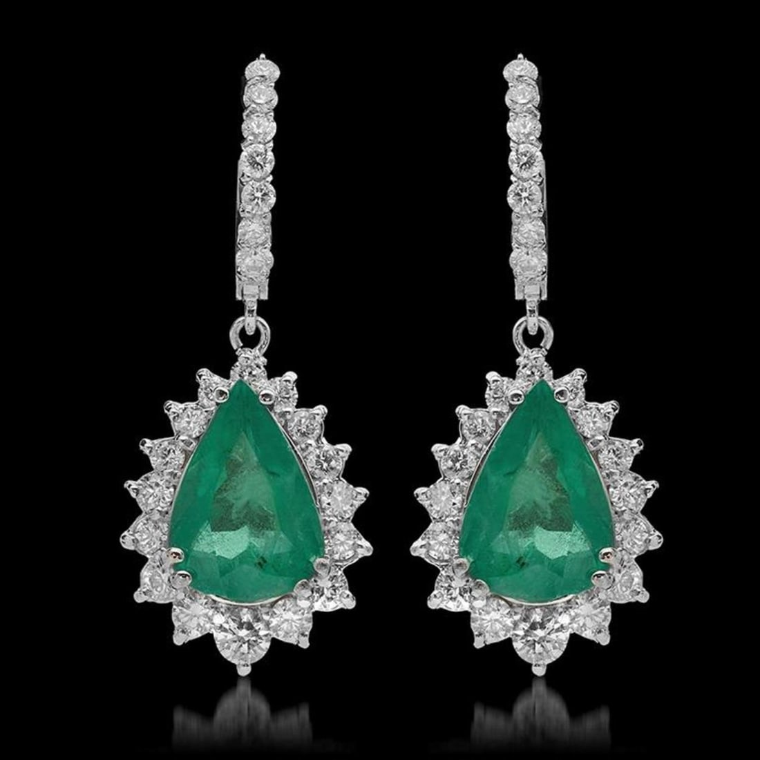 14K Gold 7.49ct Emerald & 2.57ct Diamond Earrings: Retail: $27,918.00 ****** 14K Gold 7.49ct Emerald & 2.57ct Diamond Earrings ****** Metal: 14K Solid White Gold / Total Item Weight: 10.4 grams / Country Made: United States / / Main Stone: Emerald /