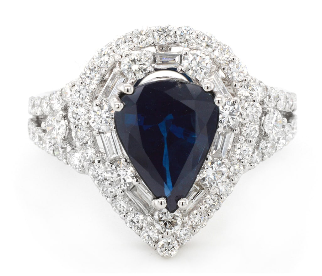 18K White Gold Ladies Ring with 2.26ct Sapphire and 1.32ct tw Adjacent Diamonds: Retail: $14,000.00 ****** 18K White Gold Ladies Ring with 2.26ct Sapphire and 1.32ct tw Adjacent Diamonds ****** Size: 6.5 / Metal: 18K White Gold / Total Item Weight: 5 Grams / Country Made: United