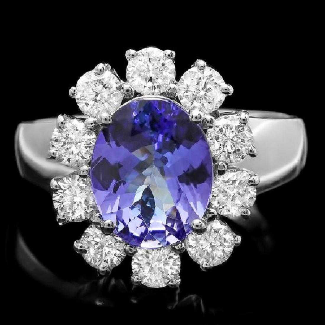 14K White Gold 2.07ct Tanzanite and 1.19ct Diamond Ring: Retail: $9,485.00 ****** 14K White Gold 2.07ct Tanzanite and 1.19ct Diamond Ring ****** Metal: 14K White Gold / Total Item Weight: 6.0 Grams / Country Made: United States / / Main Stone: Tanzanite /