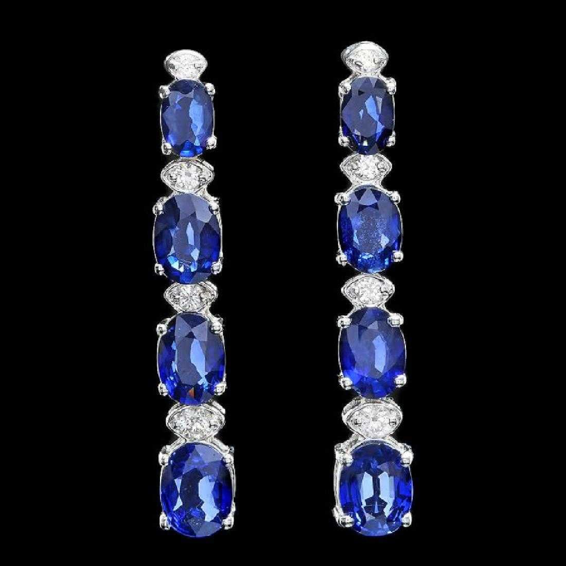 14K White Gold 6.88ct Sapphire and 0.37ct Diamond Earrings: Retail: $5,500.00 ****** 14K White Gold 6.88ct Sapphire and 0.37ct Diamond Earrings ****** Metal: 14K White Gold / Total Item Weight: 5.0 Grams / Country Made: United States / / Main Stone: Sapphire