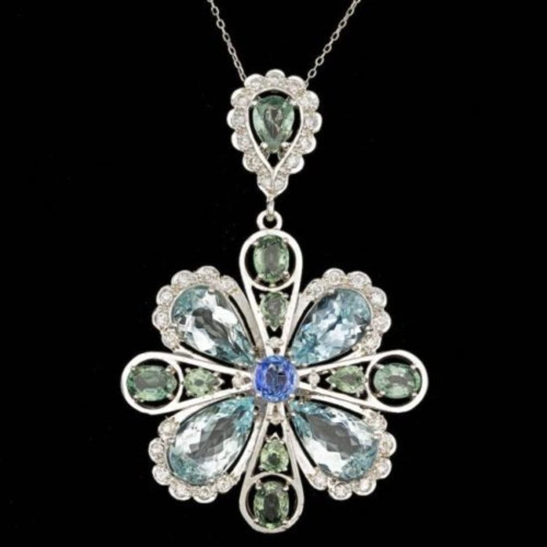 14K Gold 20.11ct Aquamarine 3.52ct Sapphire 1.49ct Diamond Pendant: Retail: $25,000.00 ****** 14K Gold 20.11ct Aquamarine 3.52ct Sapphire 1.49ct Diamond Pendant ****** Metal: 14K White Gold / Total Item Weight: 9.5 Grams / Country Made: United States / / Main Stone: