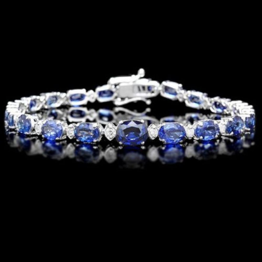 14K Gold 14.33ct Sapphire 0.73ct Diamond Bracelet: Retail: $19,000.00 ****** 14K Gold 14.33ct Sapphire 0.73ct Diamond Bracelet ****** Metal: 14K White Gold / Total Item Weight: 10.0 Grams / Country Made: United States / / Main Stone: Sapphire /