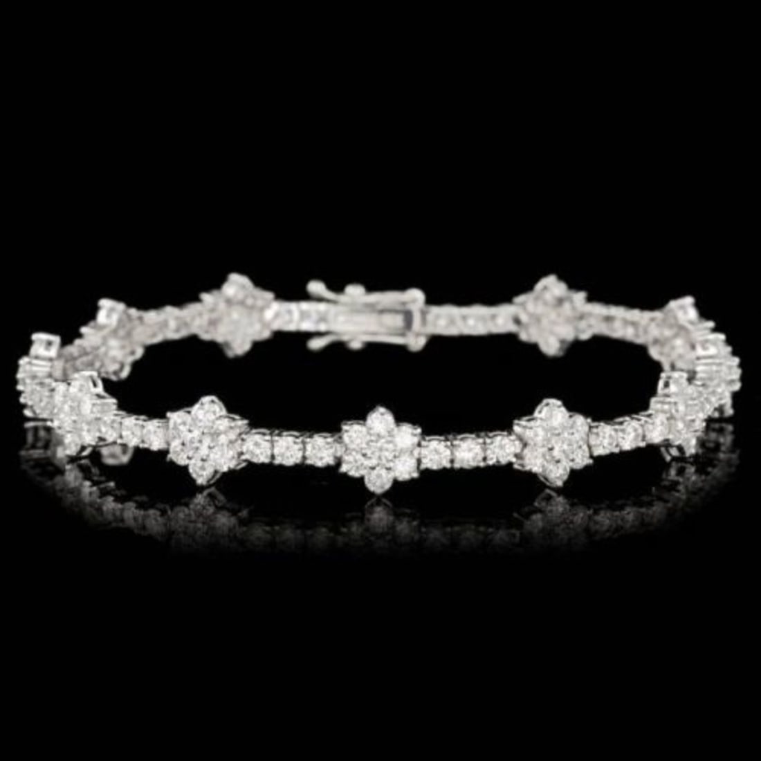18k White Gold 7.02ct Diamond Bracelet: Retail: $30,700.00 ****** 18k White Gold 7.02ct Diamond Bracelet ****** Size: 7 / Metal: 18k Solid White Gold / Total Item Weight: 10.0 grams / Country Made: United States / / Main Stone: Diamond / Co