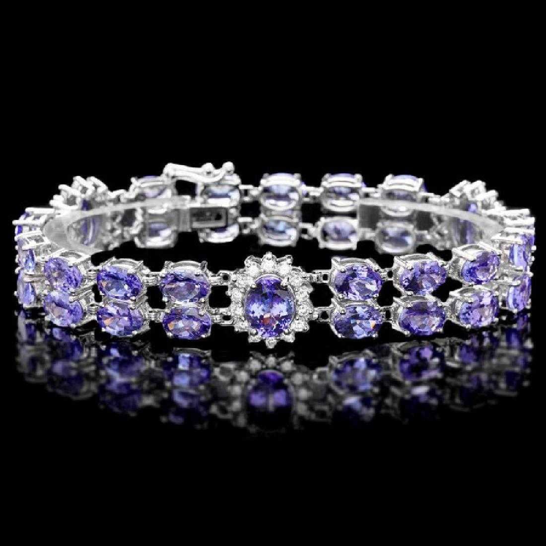 14K White Gold 28.36ct Tanzanite and 1.05ct Diamond Bracelet: Retail: $23,527.00 ****** 14K White Gold 28.36ct Tanzanite and 1.05ct Diamond Bracelet ****** Metal: 14K White Gold / Total Item Weight: 24.5 Grams / Country Made: United States / / Main Stone: