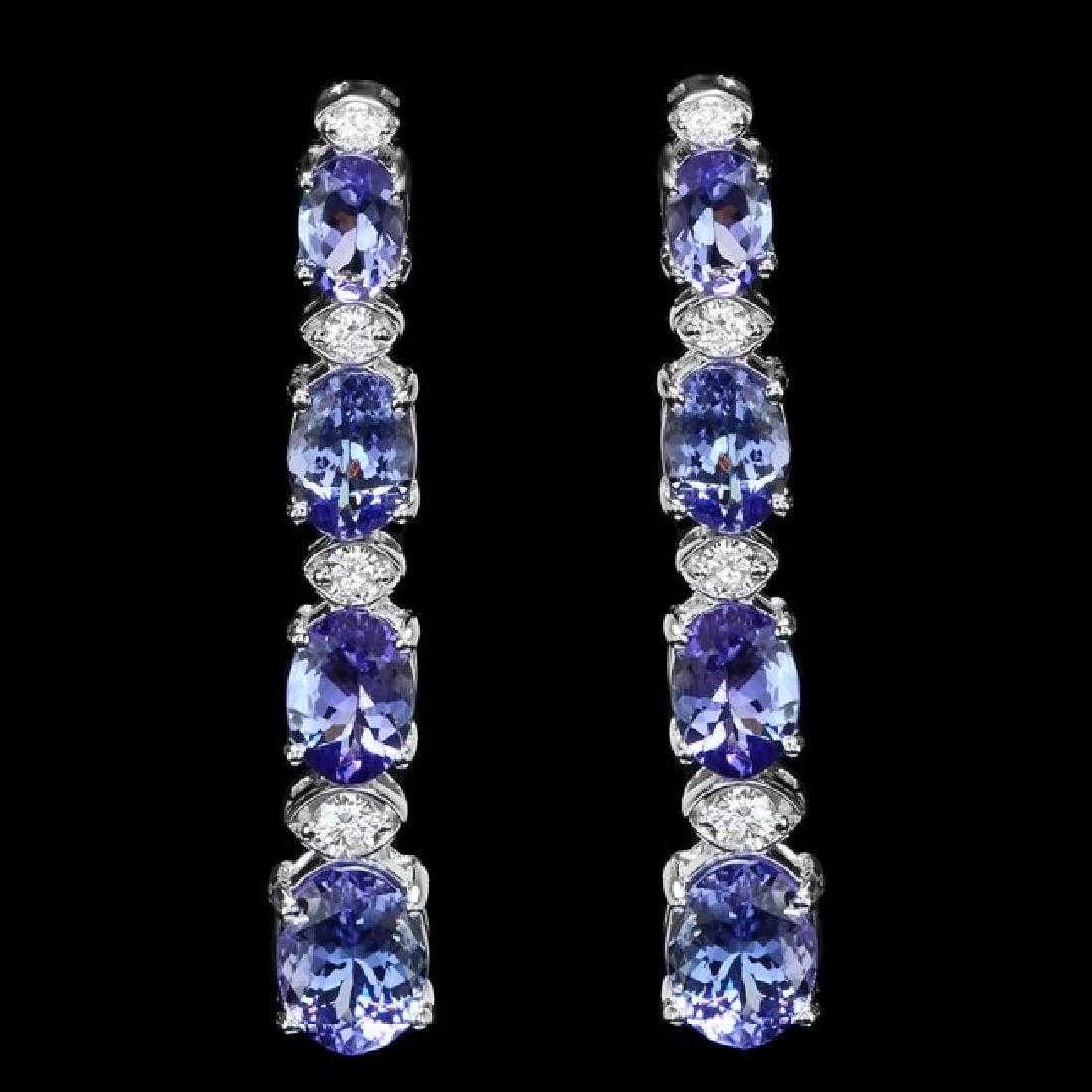 14K White Gold 5.88ct Tanzanite and 0.47ct Diamond Earrings: Retail: $6,792.00 ****** 14K White Gold 5.88ct Tanzanite and 0.47ct Diamond Earrings ****** Metal: 14K White Gold / Total Item Weight: 5.0 Grams / Country Made: United States / / Main Stone: Tanzanite