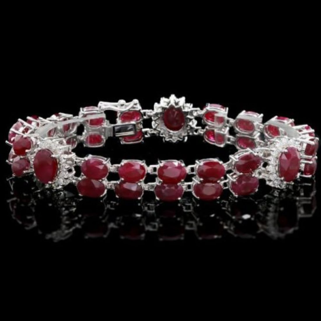 14K Gold 42.78ct Ruby 1.61ct Diamond Bracelet: Retail: $23,325.00 ****** 14K Gold 42.78ct Ruby 1.61ct Diamond Bracelet ****** Metal: 14K White Gold / Total Item Weight: 28.5 Grams / Country Made: United States / / Main Stone: Ruby / Color: Red /