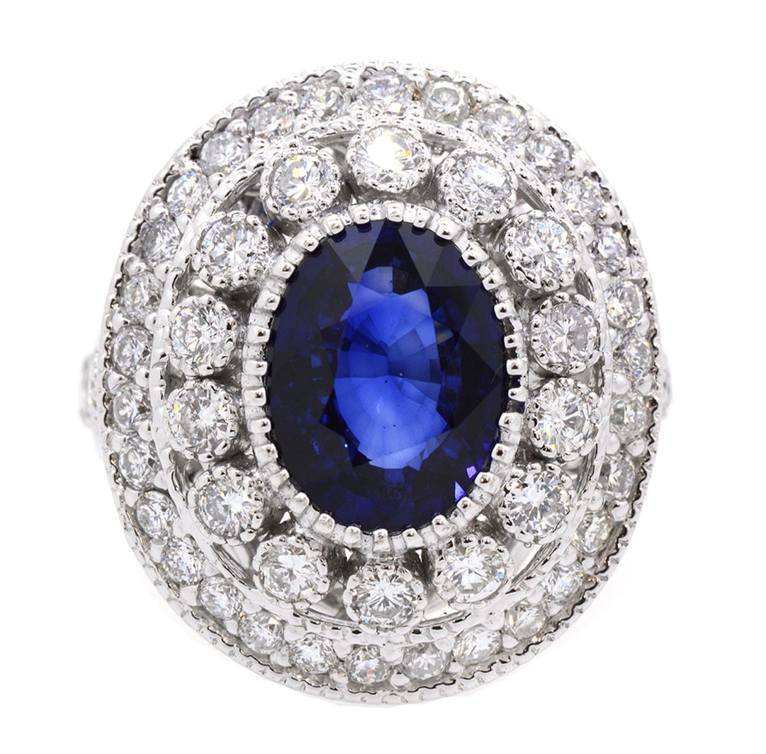 18K White Gold Ladies Ring with 3.33ct Sapphire and 1.64ct tw Adjacent Diamonds: Retail: $12,500.00 ****** 18K White Gold Ladies Ring with 3.33ct Sapphire and 1.64ct tw Adjacent Diamonds ****** Size: 6.5 / Metal: 18K White Gold / Total Item Weight: 14.6 Grams / Country Made: