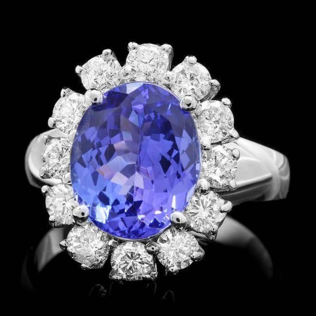 14K White Gold 3.42ct Tanzanite and 1.08ct Diamond Ring: Retail: $11,827.00 ****** 14K White Gold 3.42ct Tanzanite and 1.08ct Diamond Ring ****** Metal: 14K White Gold / Total Item Weight: 6.5 Grams / Country Made: United States / / Main Stone: Tanzanite
