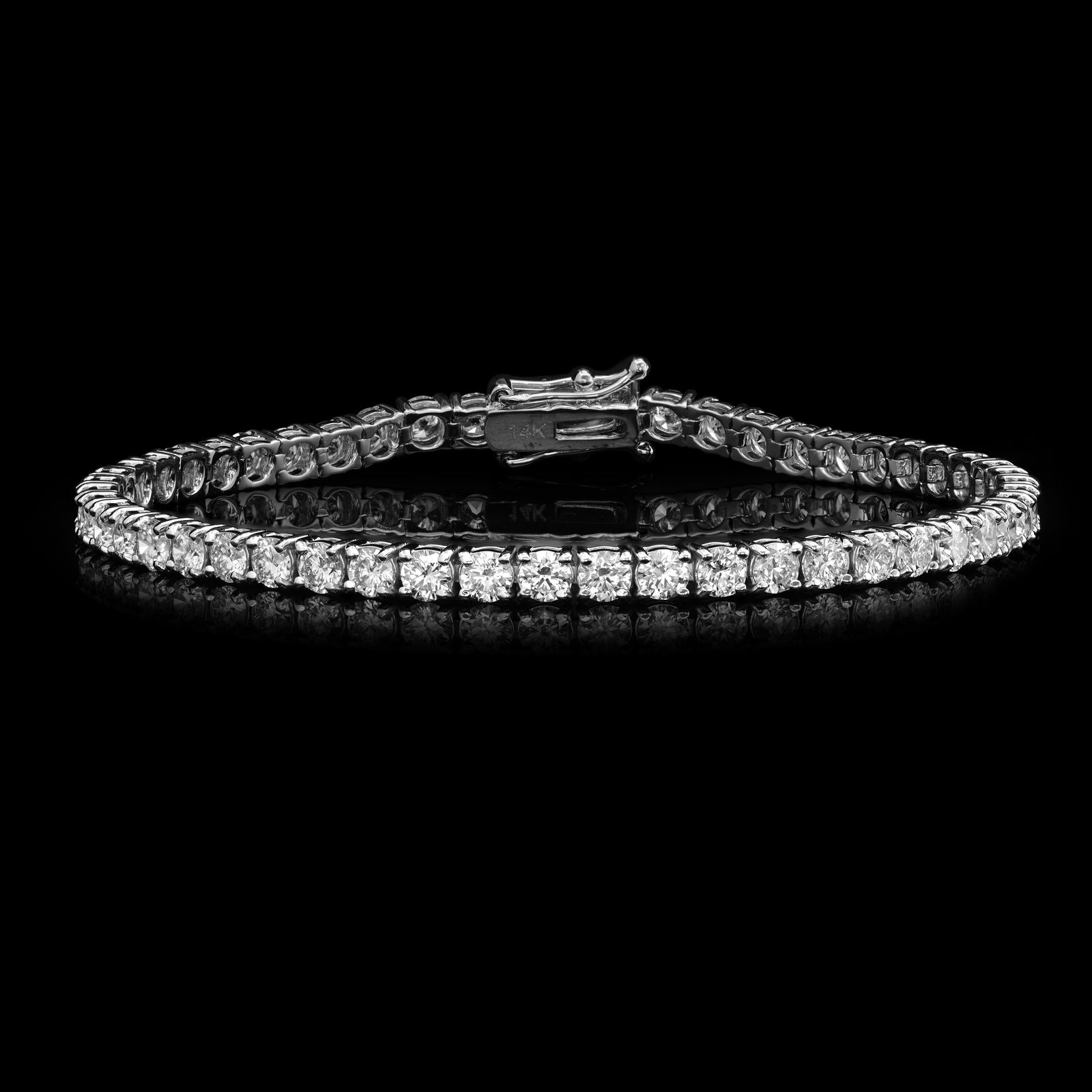 14K White Gold and 7.48ct Diamond Bracelet: Retail: $29,886.00 ****** 14K White Gold and 7.48ct Diamond Bracelet ****** Metal: 14K White Gold / Total Item Weight: 9.8 Grams / Country Made: United States / / Main Stone: Diamond / Carat Total