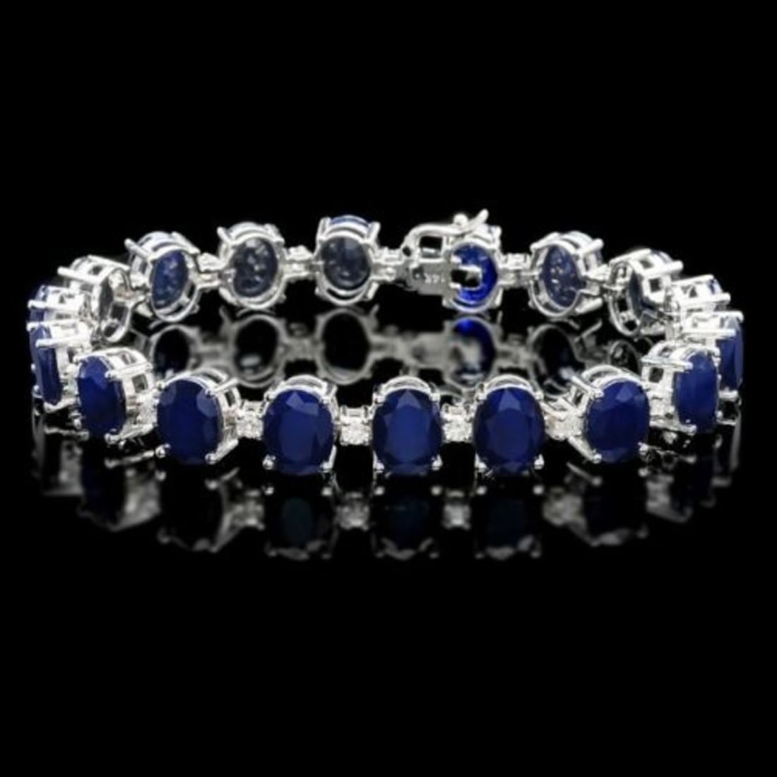 14K Gold 40.07ct Sapphire 1.39ct Diamond Bracelet: Retail: $24,875.00 ****** 14K Gold 40.07ct Sapphire 1.39ct Diamond Bracelet ****** Metal: 14K White Gold / Total Item Weight: 24.0 Grams / Country Made: United States / / Main Stone: Sapphire /