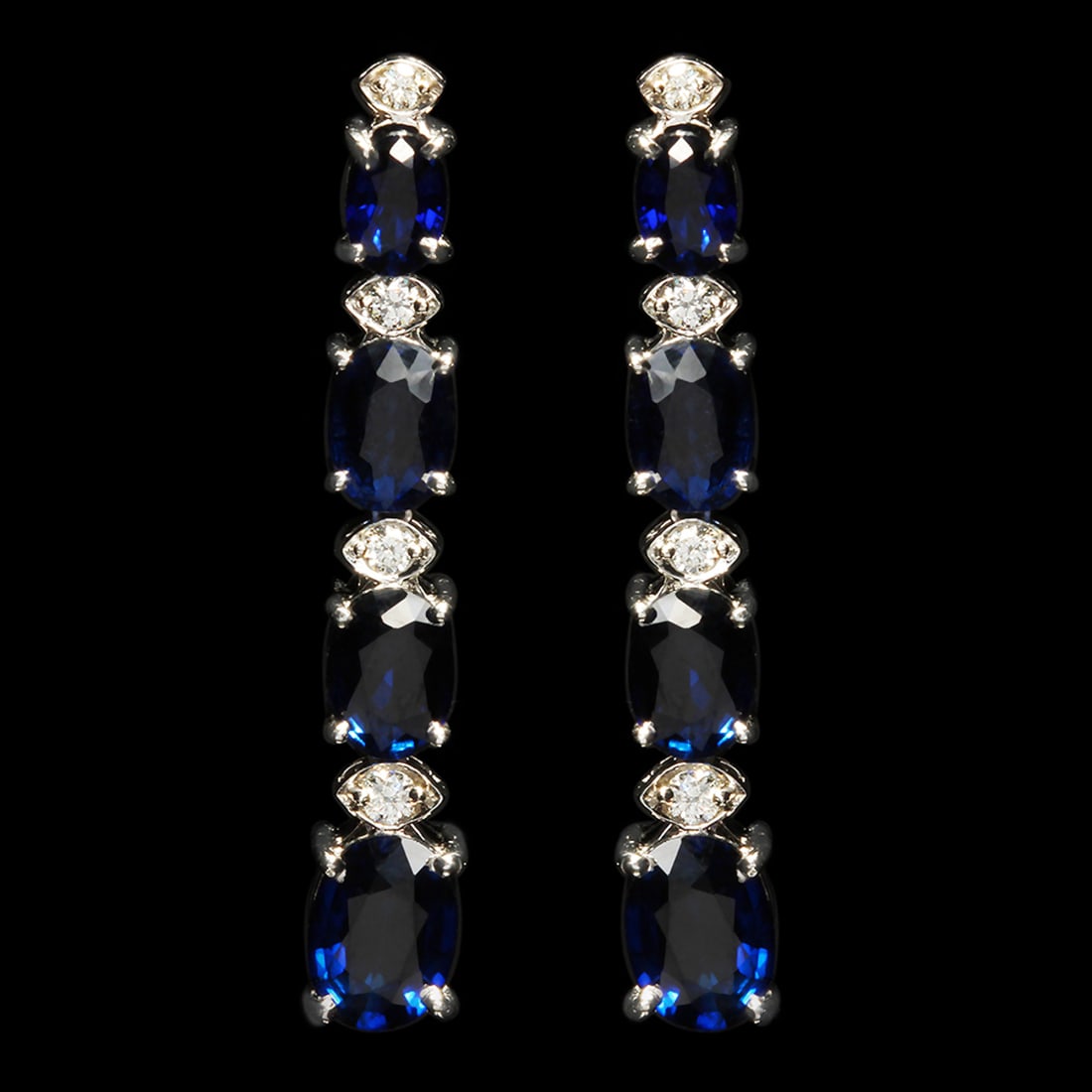 14k White Gold 1.50ct Sapphire 0.48ct Diamond Earrings: Retail: $3,130.00 ****** 14k White Gold 1.50ct Sapphire 0.48ct Diamond Earrings ****** Metal: 14K White Gold / Total Item Weight: 4.6 grams / Country Made: United States / / Main Stone: Sapphire /
