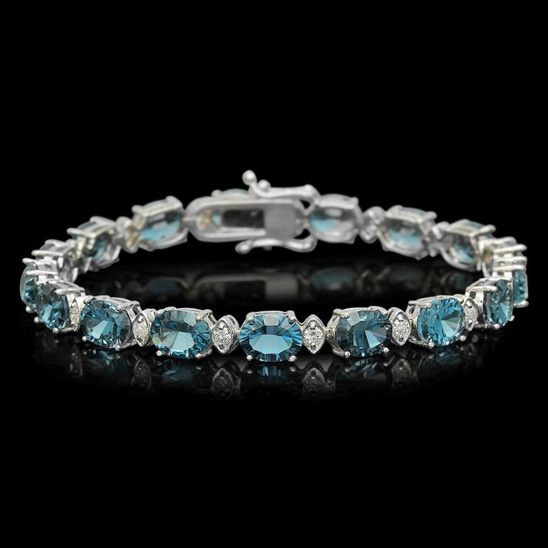 14K Gold 23.16ct Topaz 0.99ct Diamond Bracelet: Retail: $8,150.00 ****** 14K Gold 23.16ct Topaz 0.99ct Diamond Bracelet ****** Metal: 14K Solid Gold / Total Item Weight: 16.5 grams / Country Made: United States / / Main Stone: Blue Topaz / Color: B
