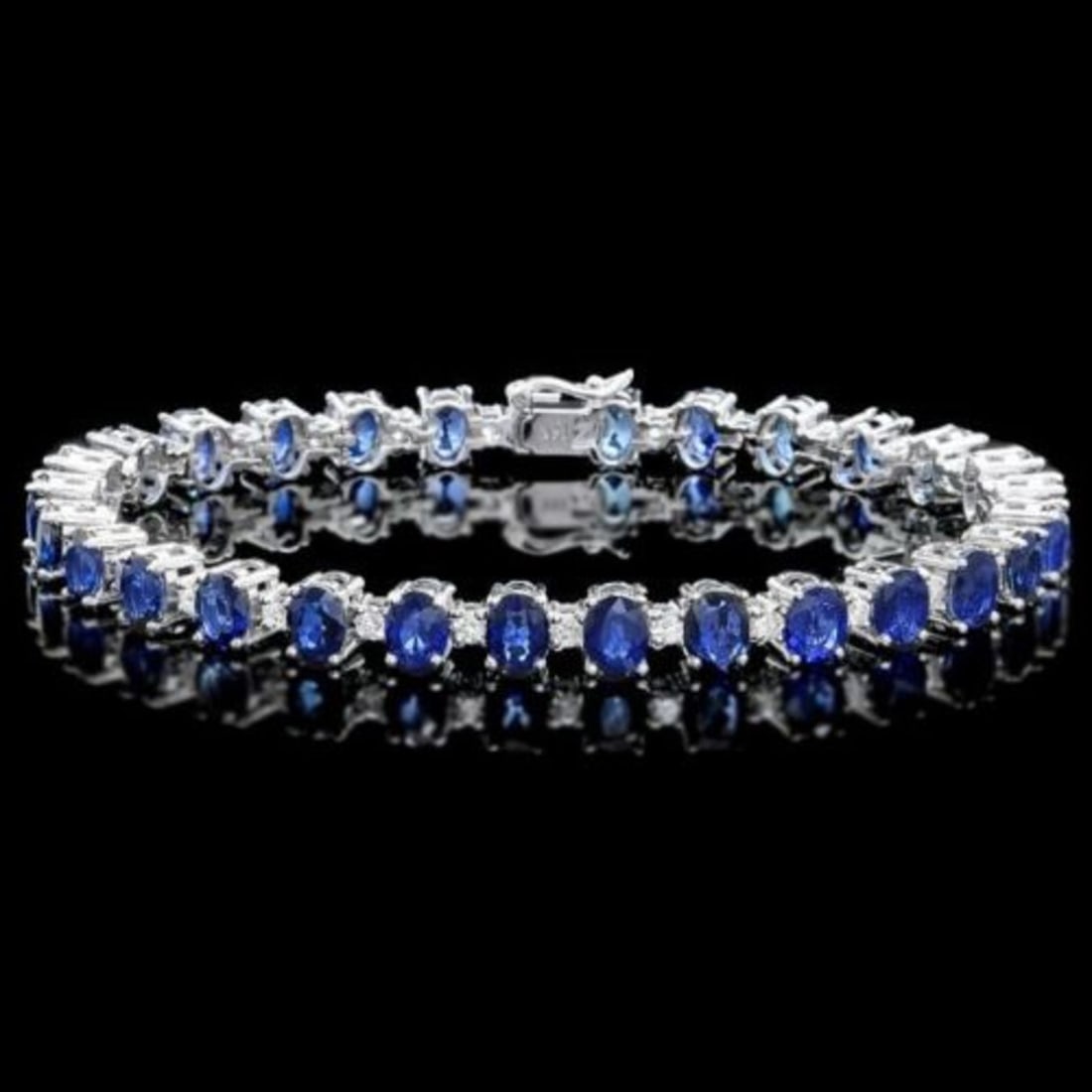 14K Gold 18.71ct Sapphire 2.06ct Diamond Bracelet: Retail: $19,760.00 ****** 14K Gold 18.71ct Sapphire 2.06ct Diamond Bracelet ****** Metal: 14K White Gold / Total Item Weight: 21.0 Grams / Country Made: United States / / Main Stone: Sapphire /