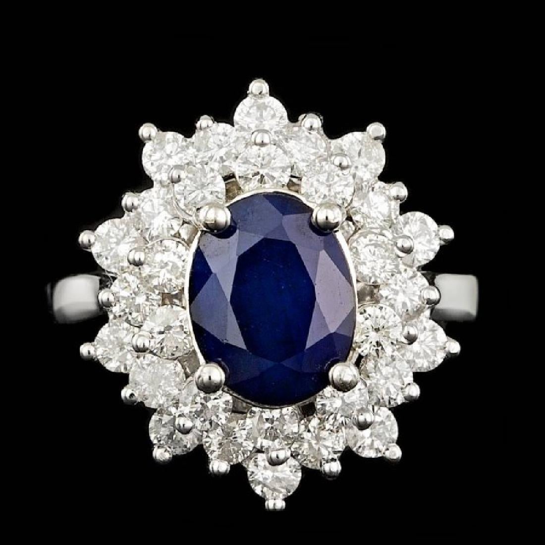 14K White Gold 1.96ct Sapphire and 1.20ct Diamond Ring: Retail: $8,766.00 ****** 14K White Gold 1.96ct Sapphire and 1.20ct Diamond Ring ****** Metal: 14K White Gold / Total Item Weight: 5.5 Grams / Country Made: United States / / Main Stone: Sapphire / Col