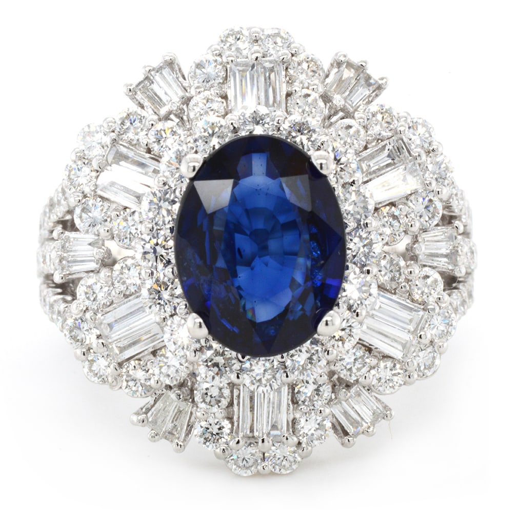 18K White Gold Ladies Ring with 2.74ct Sapphire and 2.02ct tw Adjacent Diamonds: Retail: $10,500.00 ****** 18K White Gold Ladies Ring with 2.74ct Sapphire and 2.02ct tw Adjacent Diamonds ****** Size: 6.5 / Metal: 18K White Gold / Total Item Weight: 7.2 Grams / Country Made: United