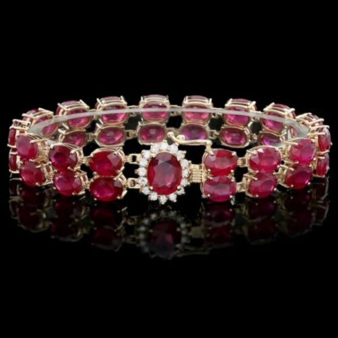 14K Yellow Gold 57.88ct Ruby and 0.53ct Diamond Bracelet: Retail: $18,720.00 ****** 14K Yellow Gold 57.88ct Ruby and 0.53ct Diamond Bracelet ****** Metal: 14K Yellow Gold / Total Item Weight: 29 Grams / Country Made: United States / / Main Stone: Ruby /