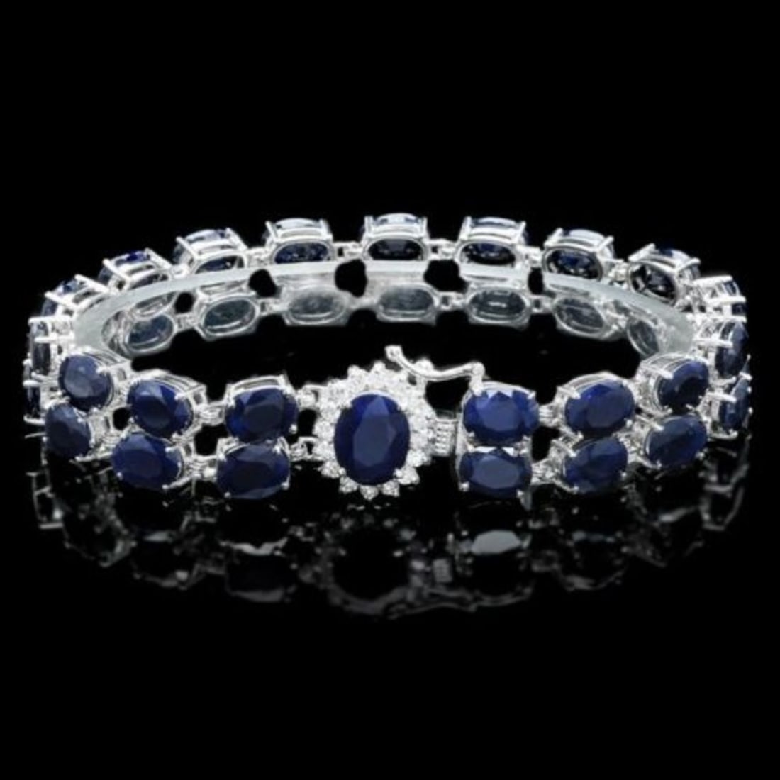 14K Gold 53.81ct Sapphire 0.59ct Diamond Bracelet: Retail: $19,000.00 ****** 14K Gold 53.81ct Sapphire 0.59ct Diamond Bracelet ****** Metal: 14K White Gold / Total Item Weight: 28.5 Grams / Country Made: United States / / Main Stone: Sapphire /