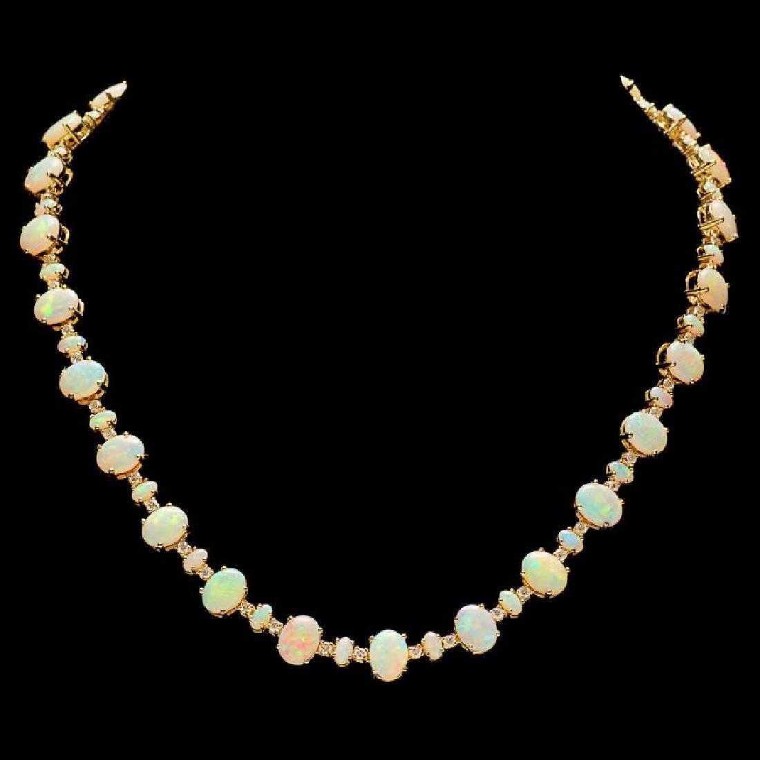 14K Yellow Gold 31.91ct Opal and 2.22ct Diamond Necklace: Retail: $46,660.00 ****** 14K Yellow Gold 31.91ct Opal and 2.22ct Diamond Necklace ****** Metal: 14K Yellow Gold / Total Item Weight: 36.5 Grams / Country Made: United States / / Main Stone: Opal / Co