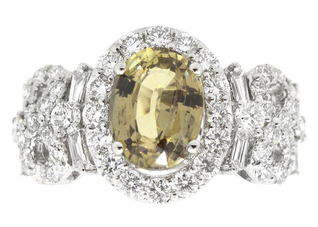 18K White Gold Ladies Ring with 1.95ct GIA Sapphire and 1.06ct tw Adjacent Diamonds: Retail: $7,500.00 ****** 18K White Gold Ladies Ring with 1.95ct GIA Sapphire and 1.06ct tw Adjacent Diamonds ****** Size: 6.5 / Metal: 18K White Gold / Total Item Weight: 4.9 Grams / Country Made: