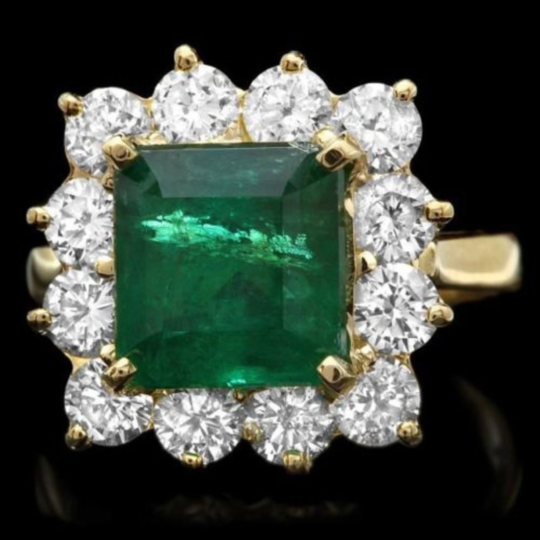 14K Yellow Gold 3.92ct Emerald and 1.98ct Diamond Ring: Retail: $27,335.00 ****** 14K Yellow Gold 3.92ct Emerald and 1.98ct Diamond Ring ****** Metal: 14K Yellow Gold / Total Item Weight: 6.5 Grams / Country Made: United States / / Main Stone: Emerald / Co