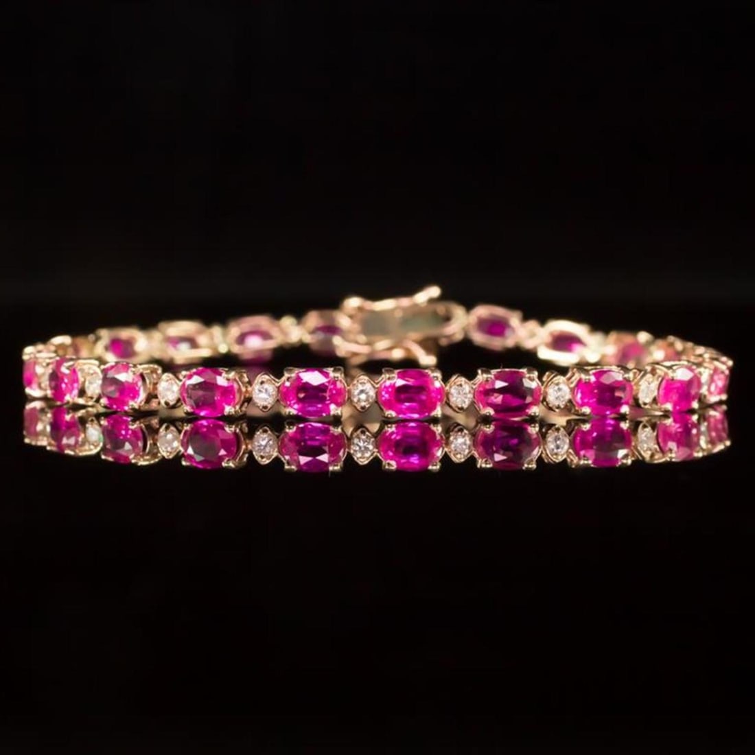 14K Rose Gold 9.88ct Pink Sapphire 0.76ct Diamond Bracelet: Retail: $8,810.00 ****** 14K Rose Gold 9.88ct Pink Sapphire 0.76ct Diamond Bracelet ****** Metal: 14K Rose Gold / Total Item Weight: 8.9 Grams / Country Made: United States / / Main Stone: Pink Sapphi