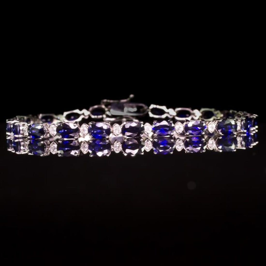 14K Gold 9.25ct Sapphire 0.75ct Diamond Bracelet: Retail: $7,640.00 ****** 14K Gold 9.25ct Sapphire 0.75ct Diamond Bracelet ****** Metal: 14K Solid White Gold / Total Item Weight: 9.3 grams / Country Made: United States / / Main Stone: Sapphire /