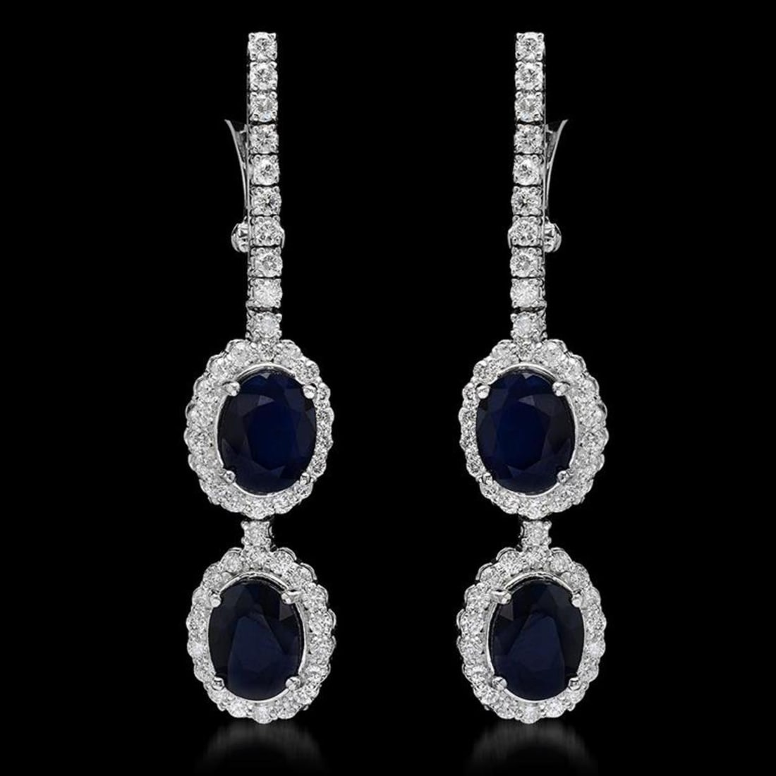 14K Gold 7.17ct Sapphire 2.00ct Diamond Earrings: Retail: $9,100.00 ****** 14K Gold 7.17ct Sapphire 2.00ct Diamond Earrings ****** Metal: 14K Solid White Gold / Total Item Weight: 10.6 grams / Country Made: United States / / Main Stone: Sapphire /