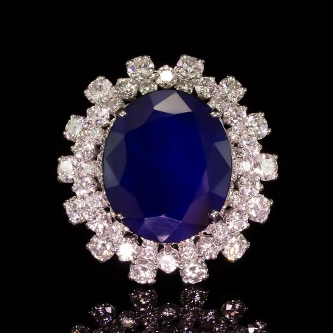 14K White Gold 12.50ct Sapphire and 3.87ct Diamond Ring: Retail: $15,165.00 ****** 14K White Gold 12.50ct Sapphire and 3.87ct Diamond Ring ****** Metal: 14K White Gold / Total Item Weight: 14.0 Grams / Country Made: United States / / Main Stone: Sapphire