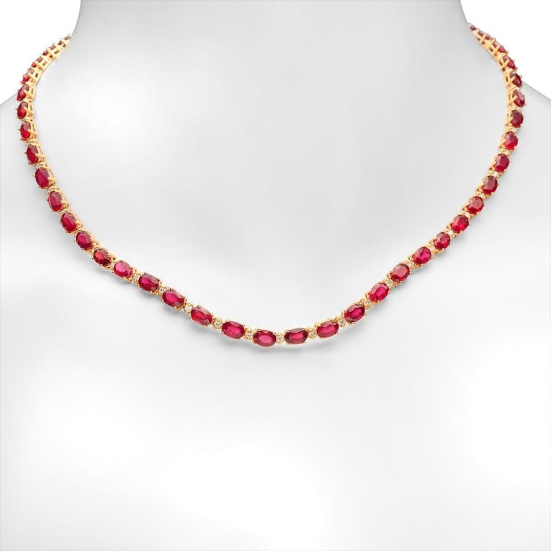 14K Gold 35.20ct Ruby 1.33cts Diamond Necklace: Retail: $16,972.00 ****** 14K Gold 35.20ct Ruby 1.33cts Diamond Necklace ****** Metal: 14K Yellow Gold / Total Item Weight: 21.1 grams / Country Made: United States / / Main Stone: Ruby / Color: Red