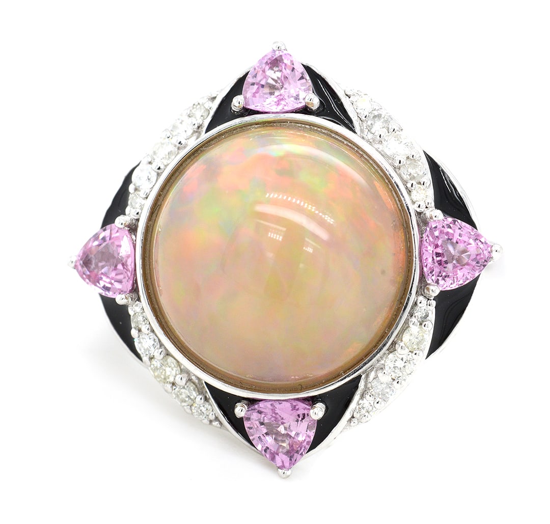 Platinum Ladies Ring with 6.53ct Cabochon Opal, 0.95tcw Pink Sapphires and 0.21tcw diamonds: Retail: $10,920.00 ****** Platinum Ladies Ring with 6.53ct Cabochon Opal, 0.95tcw Pink Sapphires and 0.21tcw diamonds ****** Size: 6.5 / Metal: Platinum / Total Item Weight: 9.3 Grams / Country Made: