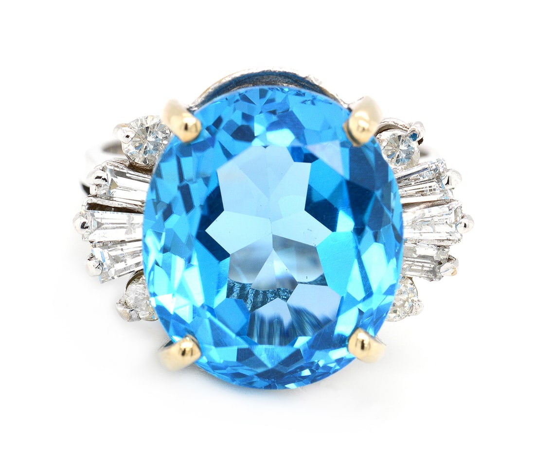 14K White Gold Ladies Ring with 12.0ct Topaz and 0.50tcw Adjacent Diamonds: Retail: $6,000.00 ****** 14K White Gold Ladies Ring with 12.0ct Topaz and 0.50tcw Adjacent Diamonds ****** Size: 6.5 / Metal: 14K White Gold / Total Item Weight: 8.2 Grams / Country Made: United