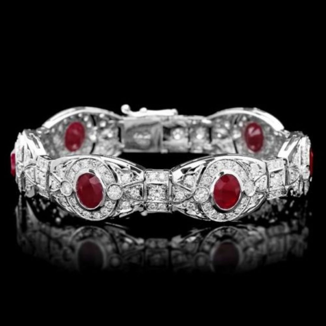 14K Gold 10.91ct Ruby 6.92ct Diamond Bracelet: Retail: $42,610.00 ****** 14K Gold 10.91ct Ruby 6.92ct Diamond Bracelet ****** Metal: 14K White Gold / Total Item Weight: 31.5 Grams / Country Made: United States / / Main Stone: Ruby / Color: Red /