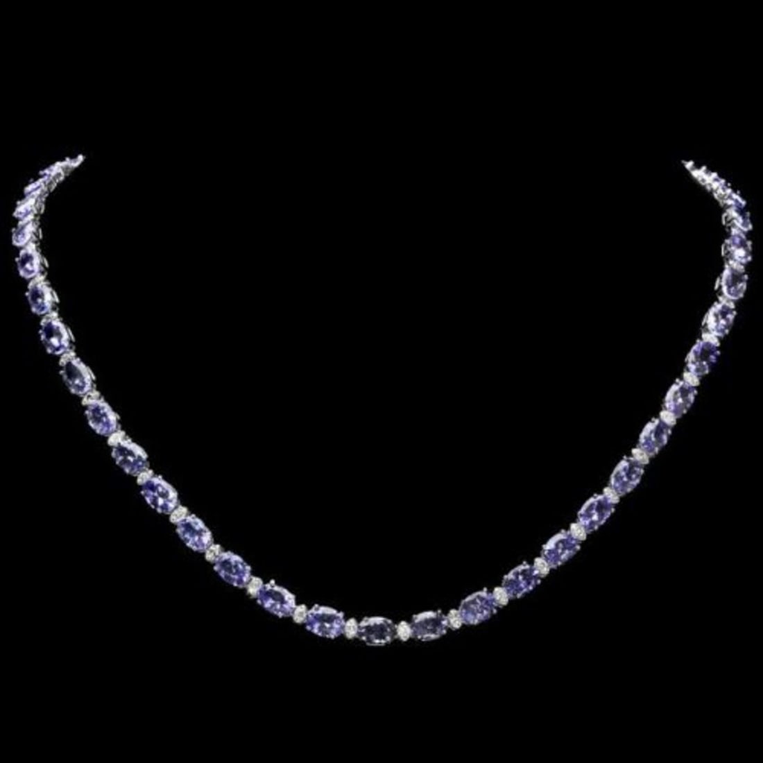 14K White Gold 36.32ct Tanzanite and 1.10ct Diamond Necklace: Retail: $24,475.00 ****** 14K White Gold 36.32ct Tanzanite and 1.10ct Diamond Necklace ****** Metal: 14K White Gold / Total Item Weight: 24.5 Grams / Country Made: United States / / Main Stone: